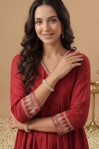 Women Ethnic Motifs Embroidered Regular Liva Kurta with Trousers
