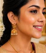 matt gold peacock jhumka earrings with ruby green stones & pearl drops   south indian temple jewellery for women