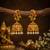 matt gold peacock jhumka earrings with ruby green stones & pearl drops   south indian temple jewellery for women