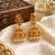 matt gold peacock jhumka earrings with ruby green stones & pearl drops   south indian temple jewellery for women