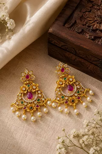 Matt gold floral chandbali earrings with ruby green stones & pearl drops | south indian temple jewellery for women