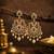 gold plated cz chandbali earrings with green ruby stones & pearl drops   ethnic party wear for women