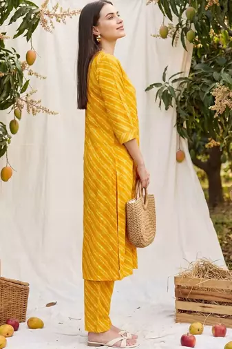 Women Dyed Regular Kurta with Trousers
