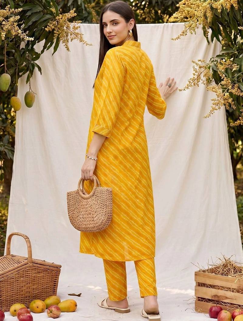 Women Dyed Regular Kurta with Trousers