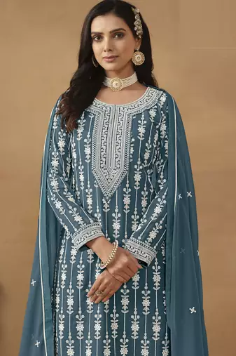 exquisite teal blue embroidered georgette sharara salwar suit