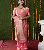 Baby pink woven banarasi silk blend saree with blouse