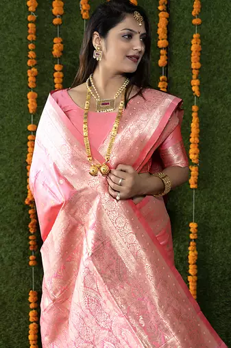 Baby pink woven banarasi silk blend saree with blouse