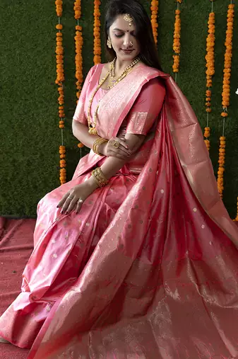 Baby pink woven banarasi silk blend saree with blouse