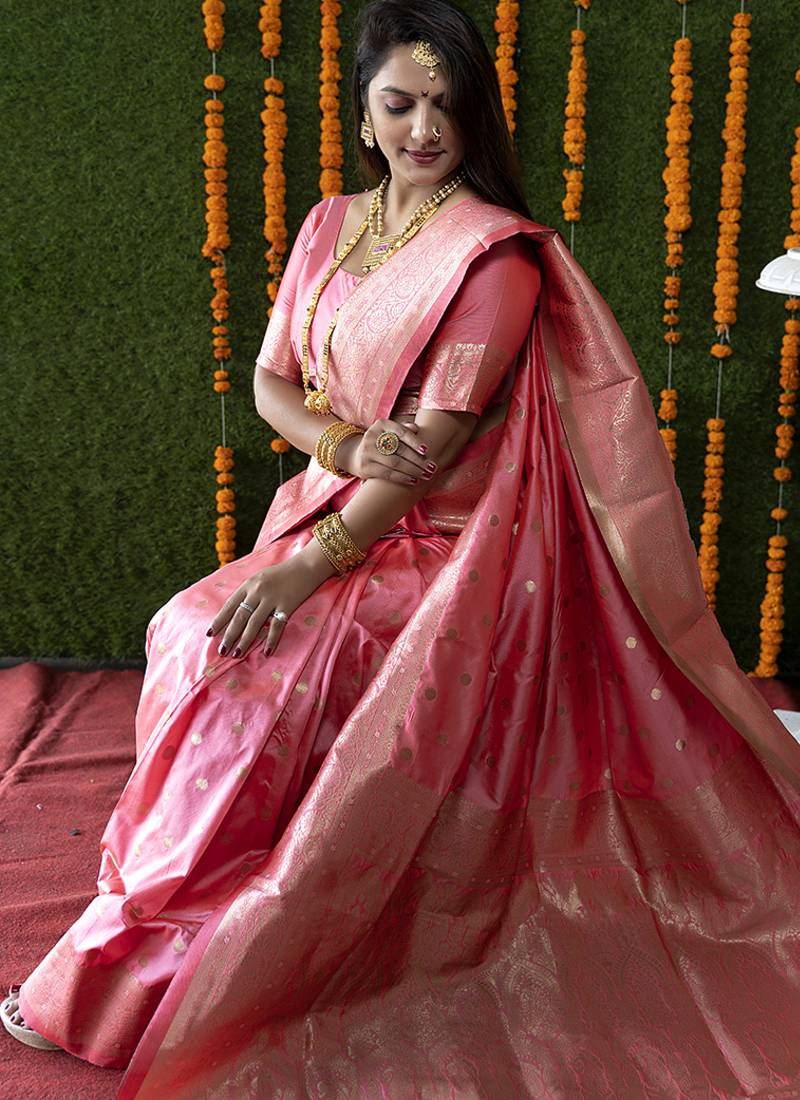 Baby pink woven banarasi silk blend saree with blouse