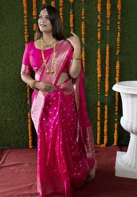 Rani pink woven banarasi silk blend saree with blouse 1