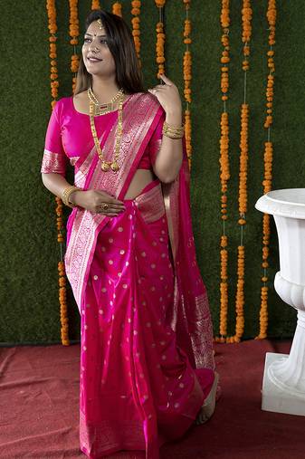 Rani pink woven banarasi silk blend saree with blouse