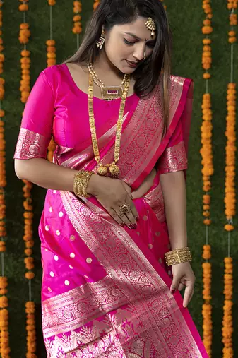 Rani pink woven banarasi silk blend saree with blouse
