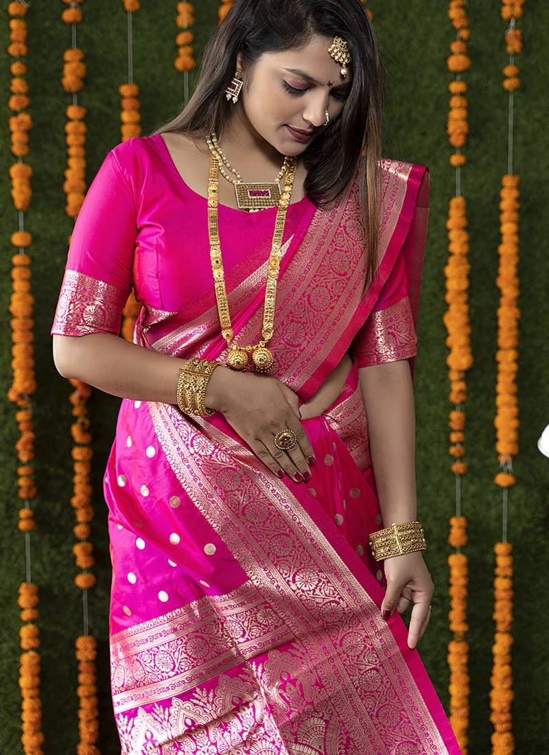 Rani pink woven banarasi silk blend saree with blouse