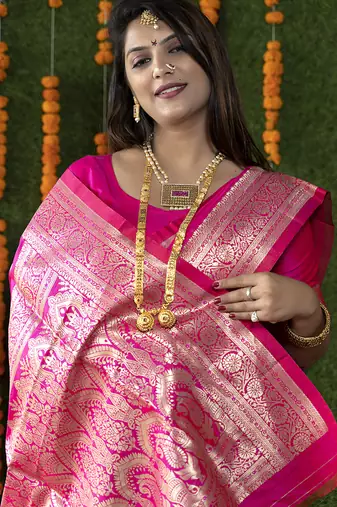 Rani pink woven banarasi silk blend saree with blouse