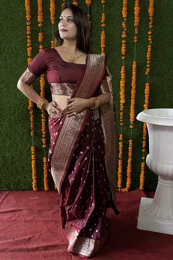 Maroon woven banarasi silk blend saree with blouse