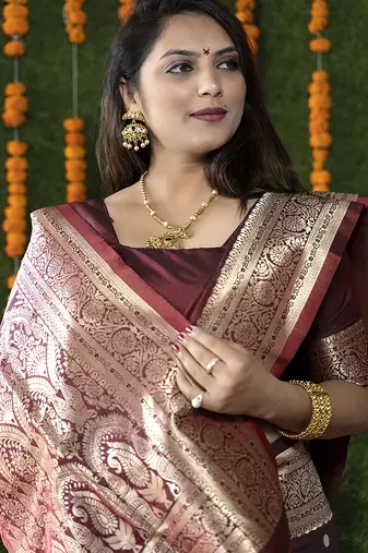 Maroon woven banarasi silk blend saree with blouse