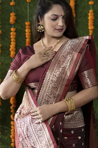 Maroon woven banarasi silk blend saree with blouse