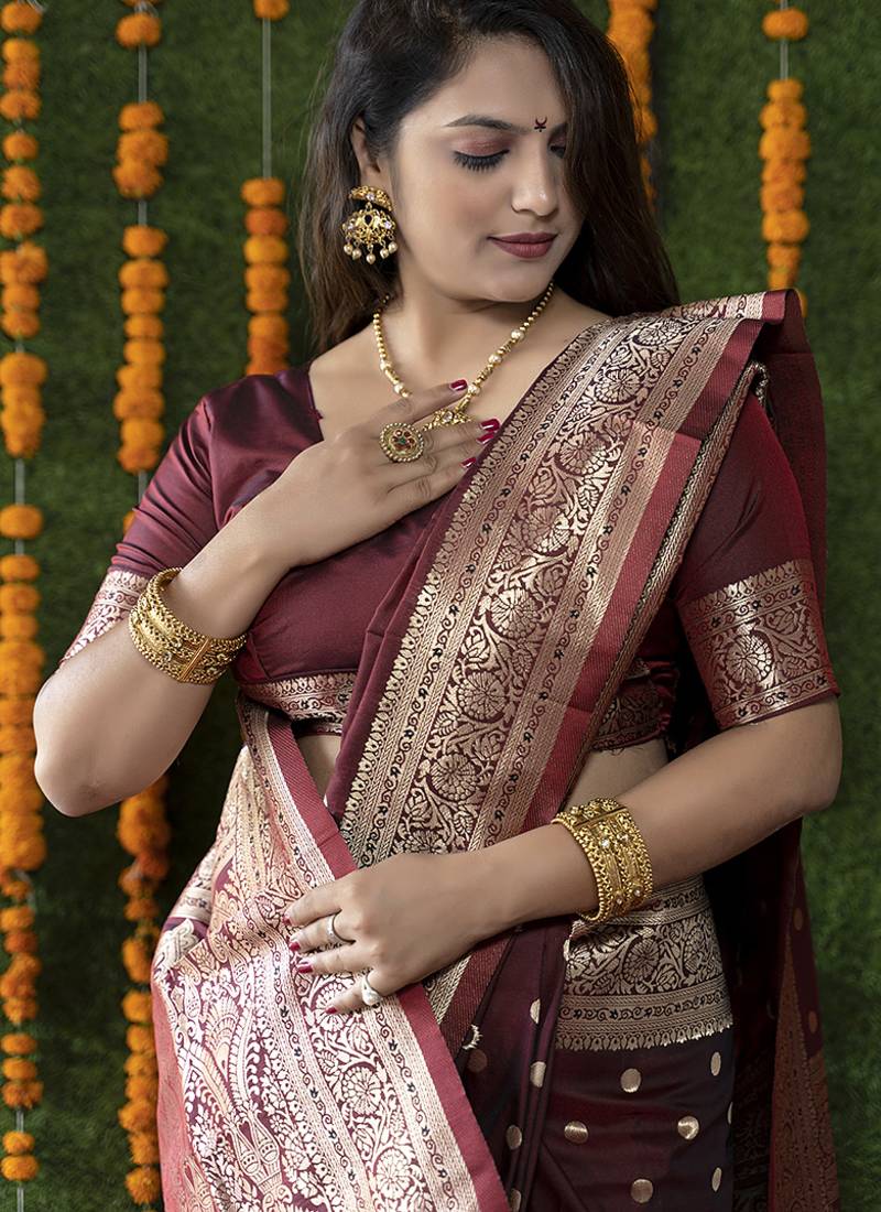 Maroon woven banarasi silk blend saree with blouse