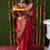 Red woven banarasi silk blend saree with blouse