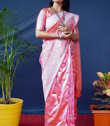 Baby pink woven banarasi silk blend saree with blouse