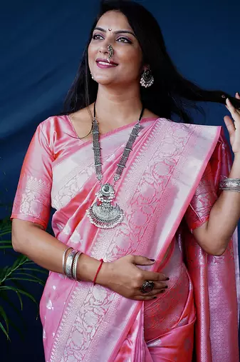 Baby pink woven banarasi silk blend saree with blouse