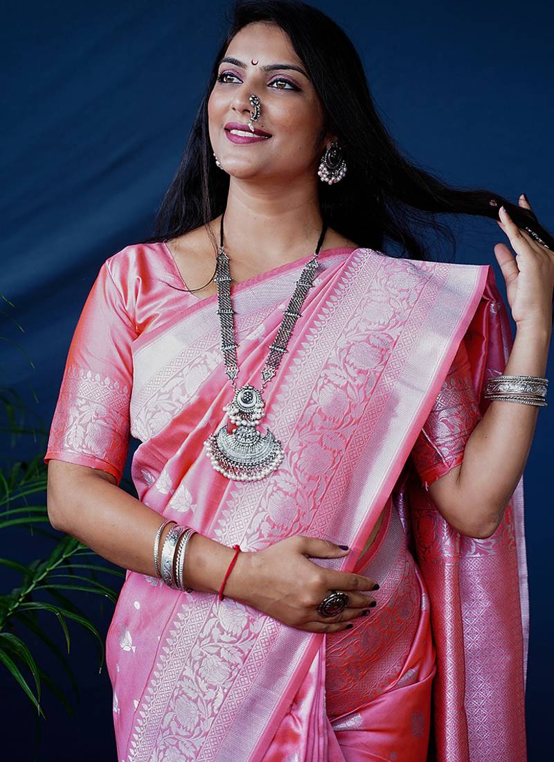 Baby pink woven banarasi silk blend saree with blouse
