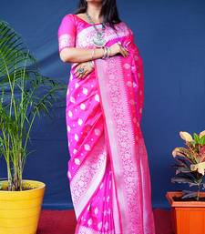 Rani pink woven banarasi silk blend saree with blouse