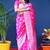Rani pink woven banarasi silk blend saree with blouse