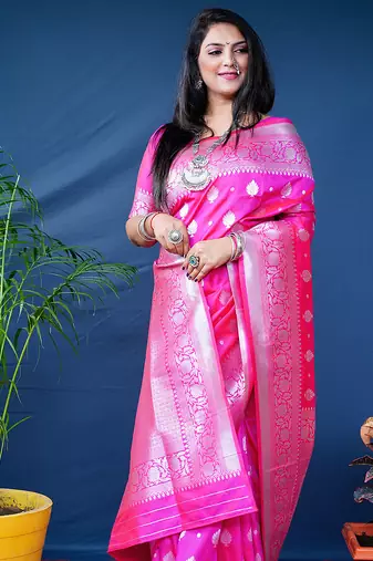 Rani pink woven banarasi silk blend saree with blouse
