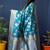 Teal blue woven banarasi silk blend saree with blouse