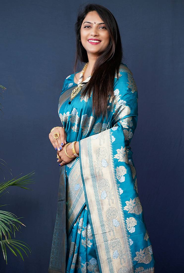 Teal blue woven banarasi silk blend saree with blouse