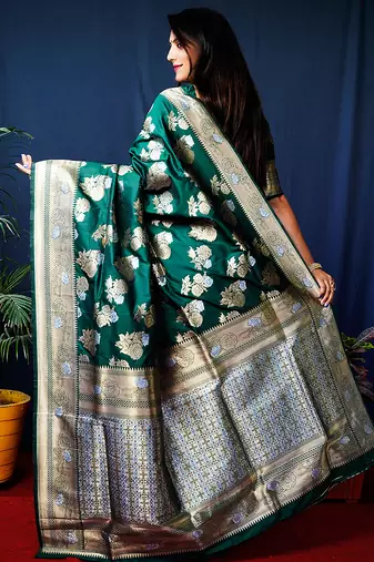 Dark green woven banarasi silk blend saree with blouse