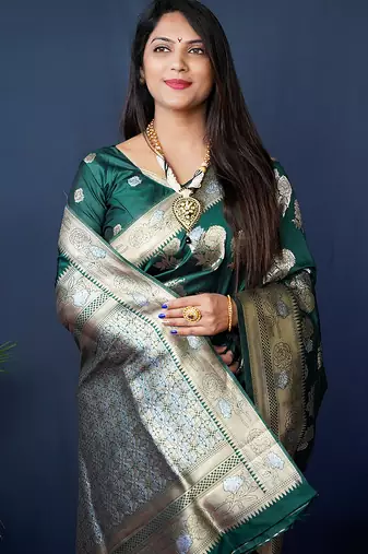 Dark green woven banarasi silk blend saree with blouse
