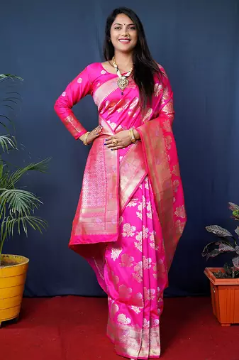 Rani pink woven banarasi silk blend saree with blouse