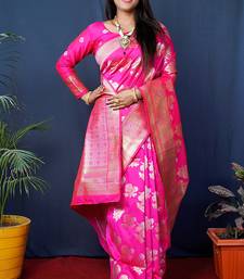 Rani pink woven banarasi silk blend saree with blouse