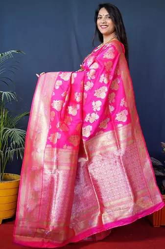 Rani pink woven banarasi silk blend saree with blouse