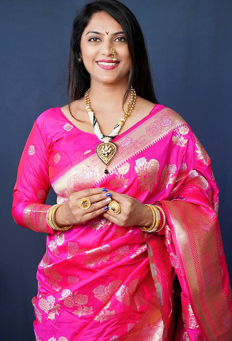 Rani pink woven banarasi silk blend saree with blouse