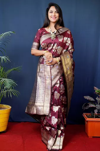 Maroon woven banarasi silk blend saree with blouse