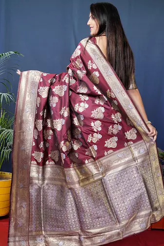 Maroon woven banarasi silk blend saree with blouse