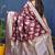Maroon woven banarasi silk blend saree with blouse