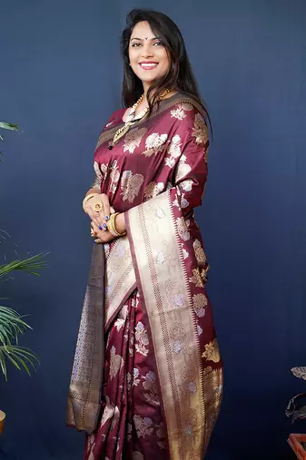 Maroon woven banarasi silk blend saree with blouse