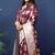 Maroon woven banarasi silk blend saree with blouse