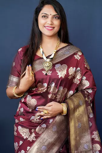Maroon woven banarasi silk blend saree with blouse