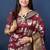 Maroon woven banarasi silk blend saree with blouse