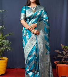 Teal blue woven banarasi silk blend saree with blouse
