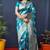 Teal blue woven banarasi silk blend saree with blouse
