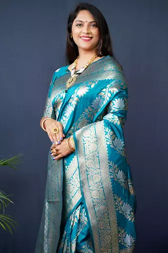 Teal blue woven banarasi silk blend saree with blouse