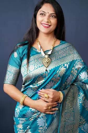 Teal blue woven banarasi silk blend saree with blouse