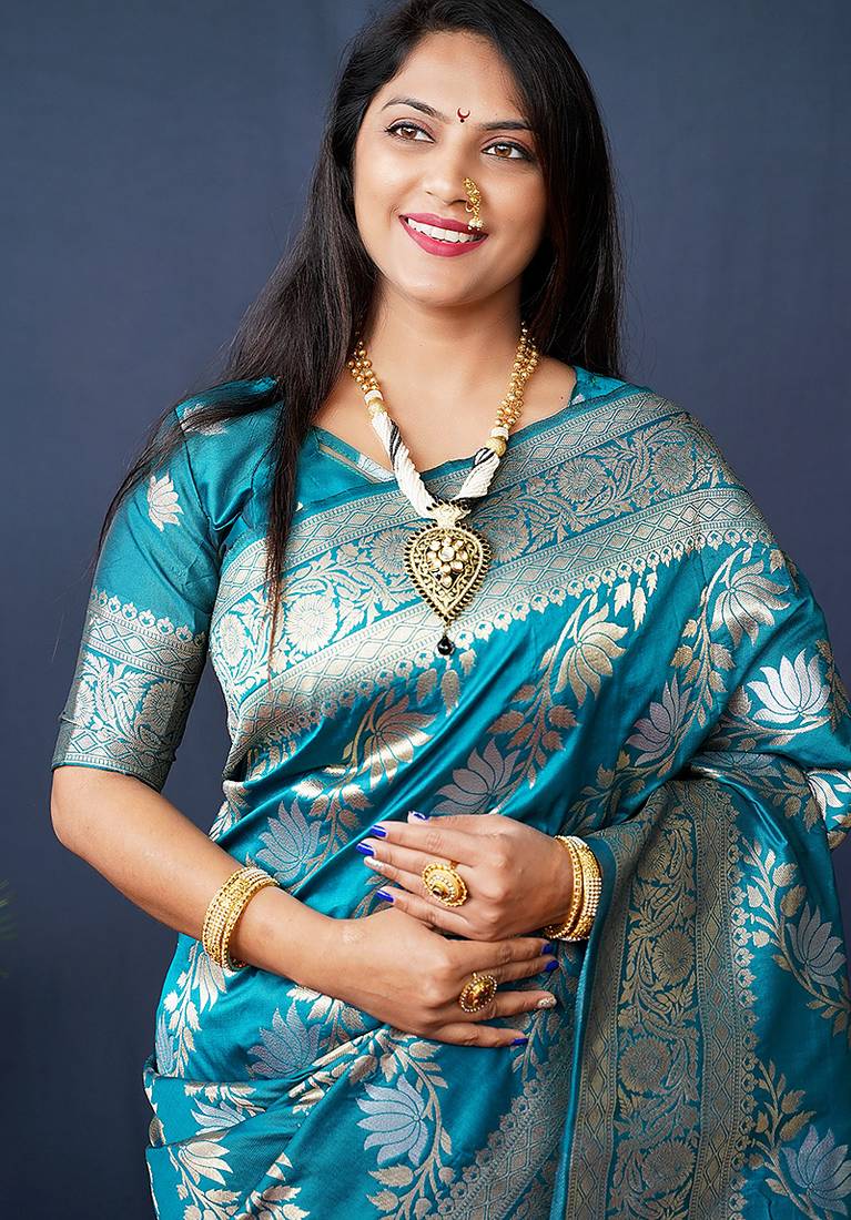 Teal blue woven banarasi silk blend saree with blouse