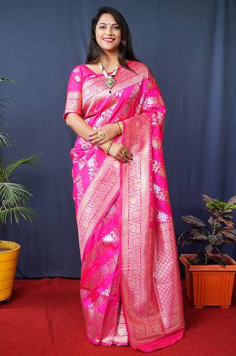 Rani pink woven banarasi silk blend saree with blouse